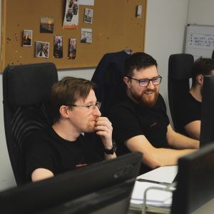 Backend developers working at the MoodUp office